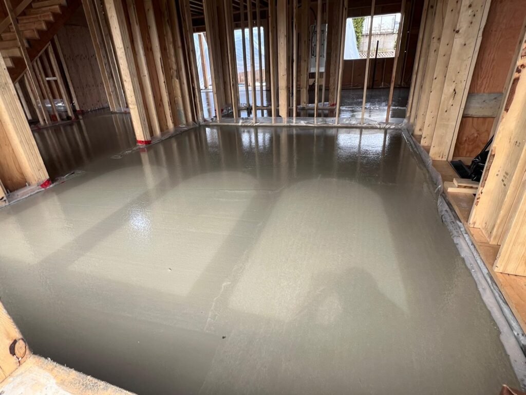 Floor leveling service by a professional construction contractor in Vancouver ensuring smooth and even surfaces